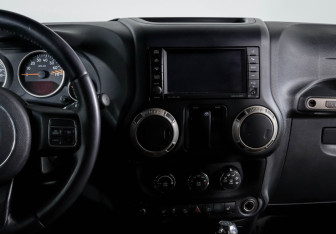 Подержанный автомобиль Jeep Wrangler 2016 года (13 фото)