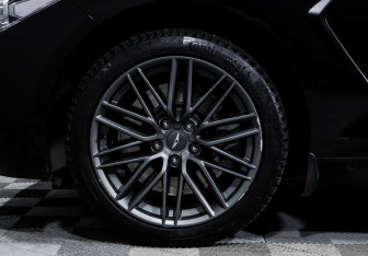 Подержанный автомобиль Genesis G70 2018 года (15 фото)