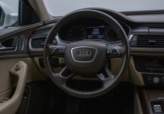 Подержанный автомобиль Audi A6 Sedan 2015 года (15 фото)