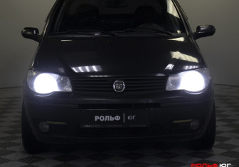 Подержанный автомобиль Fiat Albea 2010 года (17 фото)