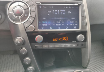 Подержанный автомобиль SsangYong Kyron 2014 года (13 фото)