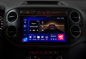 Подержанный автомобиль Volkswagen Tiguan 2014 года (17 фото)