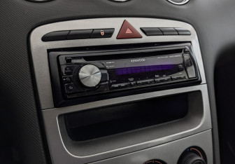 Подержанный автомобиль Peugeot 308 Hatchback 2012 года (21 фото)