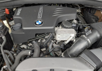Подержанный автомобиль BMW X1 2014 года (9 фото)