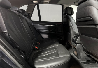 Подержанный автомобиль BMW X5 2014 года (14 фото)