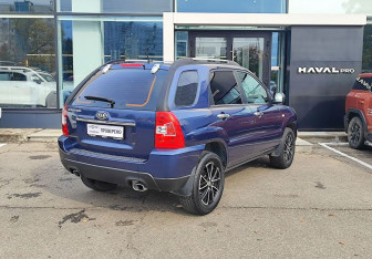 Подержанный автомобиль Kia Sportage 2009 года (5 фото)