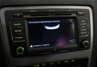 Подержанный автомобиль Skoda Octavia Liftback 2012 года (18 фото)