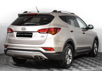Подержанный автомобиль Hyundai Santa Fe 2015 года (3 фото)
