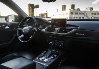 Подержанный автомобиль Audi A6 Sedan 2015 года (13 фото)