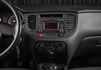 Подержанный автомобиль Kia Rio Sedan 2010 года (12 фото)