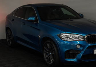 Подержанный автомобиль BMW X6 M 2016 года (28 фото)