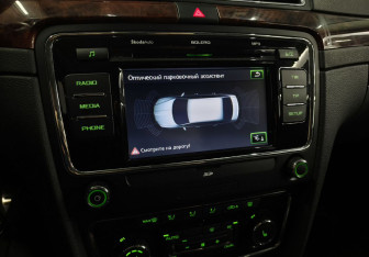 Подержанный автомобиль Skoda Superb Wagon 2013 года (19 фото)