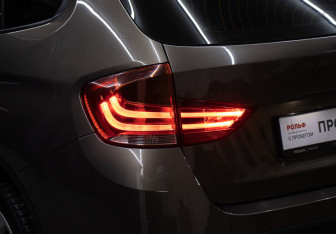 Подержанный автомобиль BMW X1 2013 года (23 фото)