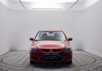 Подержанный автомобиль Mitsubishi Lancer Sedan 2004 года (2 фото)