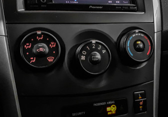 Подержанный автомобиль Toyota Corolla Sedan 2012 года (14 фото)