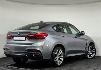 Подержанный автомобиль BMW X6 2017 года (2 фото)