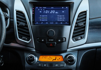 Подержанный автомобиль SsangYong Actyon 2014 года (10 фото)