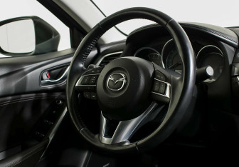 Подержанный автомобиль Mazda 6 Sedan 2015 года (13 фото)