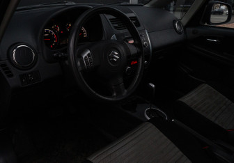 Подержанный автомобиль Suzuki SX4 Hatchback 2010 года (11 фото)