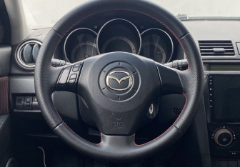 Подержанный автомобиль Mazda 3 Hatchback 2006 года (12 фото)