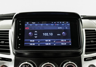 Подержанный автомобиль Mitsubishi Pajero Sport 2013 года (19 фото)