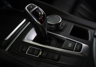 Подержанный автомобиль BMW X6 2016 года (20 фото)