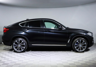 Подержанный автомобиль BMW X6 2015 года (4 фото)