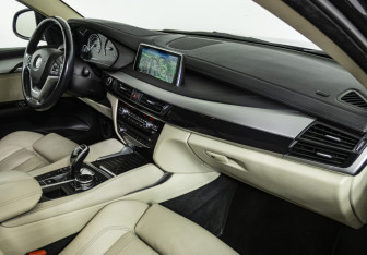 Подержанный автомобиль BMW X6 2015 года (9 фото)