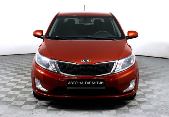 Подержанный автомобиль Kia Rio Hatchback 2013 года (2 фото)