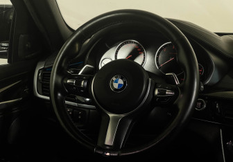 Подержанный автомобиль BMW X6 2016 года (15 фото)