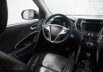 Подержанный автомобиль Hyundai Santa Fe 2015 года (14 фото)
