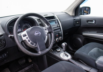 Подержанный автомобиль Nissan X-Trail 2014 года (9 фото)