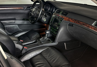 Подержанный автомобиль Skoda Superb Liftback 2011 года (11 фото)