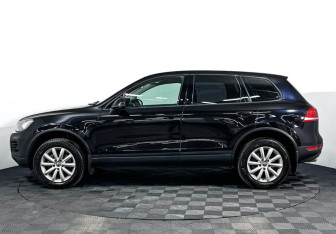 Подержанный автомобиль Volkswagen Touareg 2011 года (8 фото)