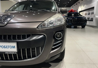 Подержанный автомобиль Peugeot 4007 2010 года (8 фото)