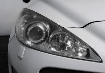 Подержанный автомобиль Peugeot 308 Convertible 2009 года (21 фото)