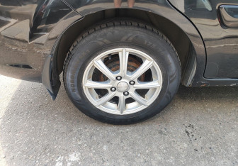 Подержанный автомобиль Kia Rio Sedan 2011 года (12 фото)