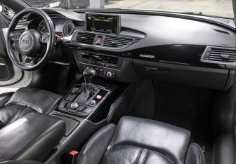 Подержанный автомобиль Audi A7 2014 года (11 фото)