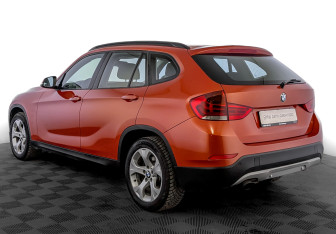 Подержанный автомобиль BMW X1 2014 года (8 фото)