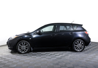 Подержанный автомобиль Mazda 3 Hatchback 2009 года (8 фото)