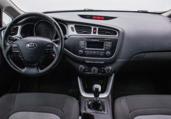 Подержанный автомобиль Kia Ceed Wagon 2014 года (13 фото)