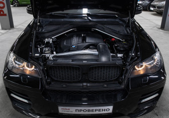 Подержанный автомобиль BMW X6 2012 года (9 фото)