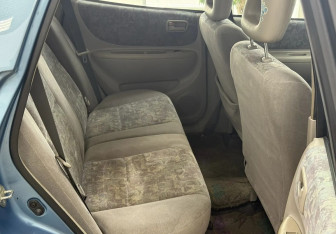 Подержанный автомобиль Toyota Corolla Spacio 1998 года (19 фото)