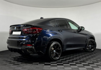 Подержанный автомобиль BMW X6 2016 года (2 фото)