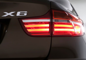 Подержанный автомобиль BMW X6 2013 года (25 фото)