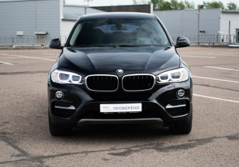 Подержанный автомобиль BMW X6 2015 года (2 фото)