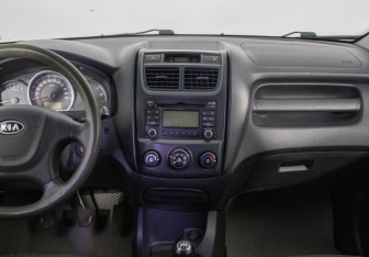 Подержанный автомобиль Kia Sportage 2009 года (14 фото)