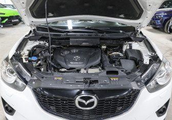 Подержанный автомобиль Mazda CX-5 2013 года (9 фото)
