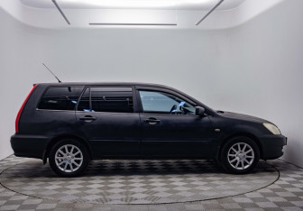 Подержанный автомобиль Mitsubishi Lancer Wagon 2006 года (4 фото)