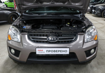 Подержанный автомобиль Kia Sportage 2010 года (9 фото)